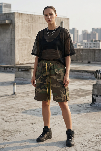 Female lifestyle shot with camo cargo shorts and Shadow Mesh Tee