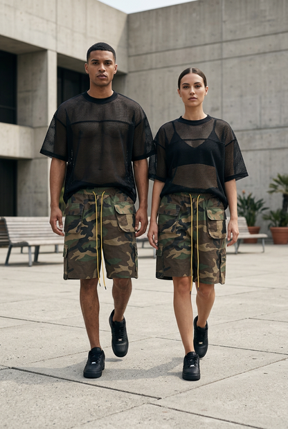 Male and female models styling camo cargo shorts with the black Shadow Mesh Tee